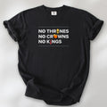 Black t-shirt with bold text reading “No Thrones No Crowns No Kings” featuring satirical Trump graphics: gold toilet, yellow hair, and long red tie, original anti-Trump protest shirt.