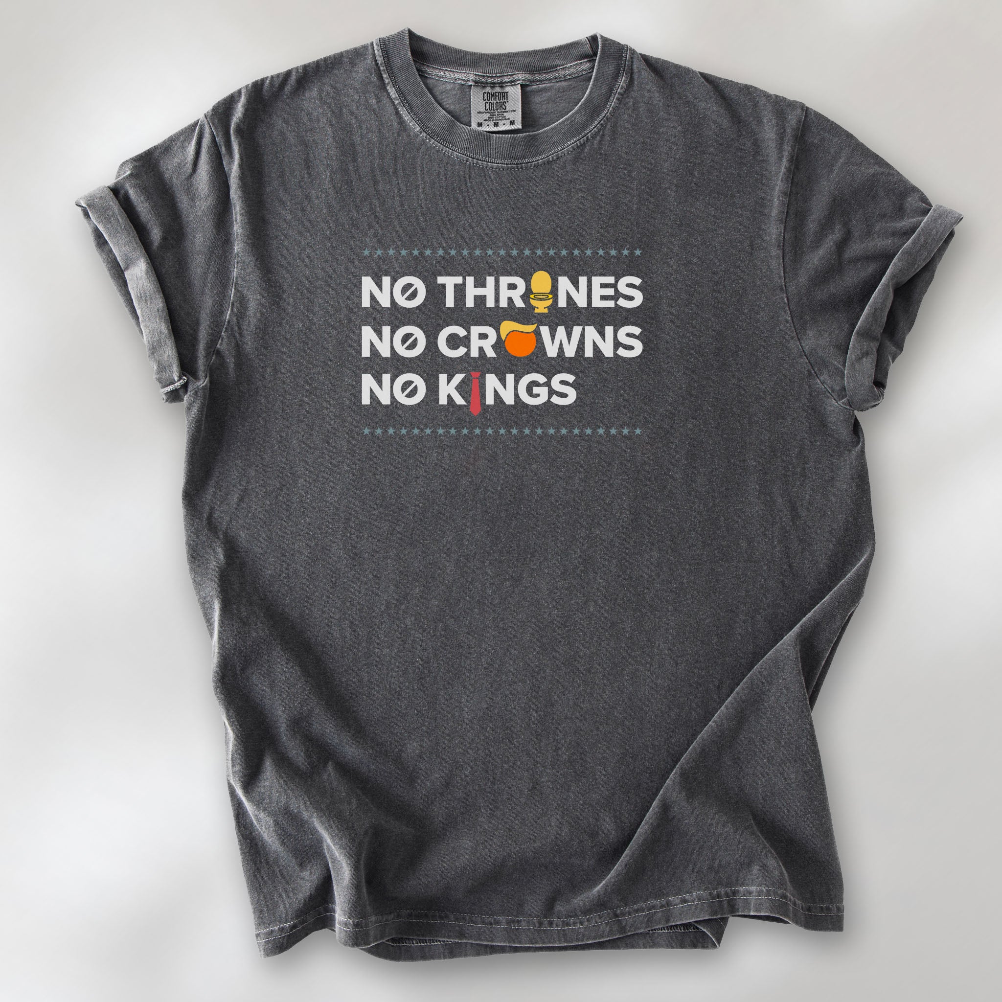 Pepper t-shirt with bold text reading “No Thrones No Crowns No Kings” featuring satirical Trump graphics: gold toilet, yellow hair, and long red tie, original anti-Trump protest shirt.