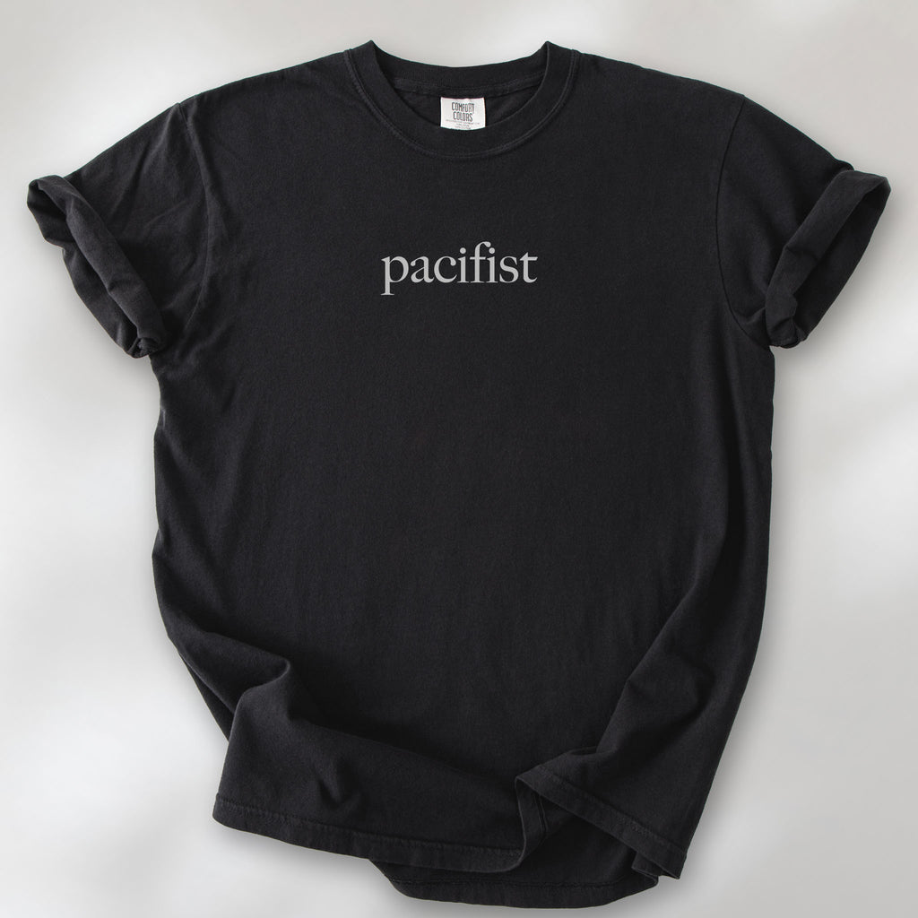 Black t-shirt with minimalist serif text reading "pacifist."