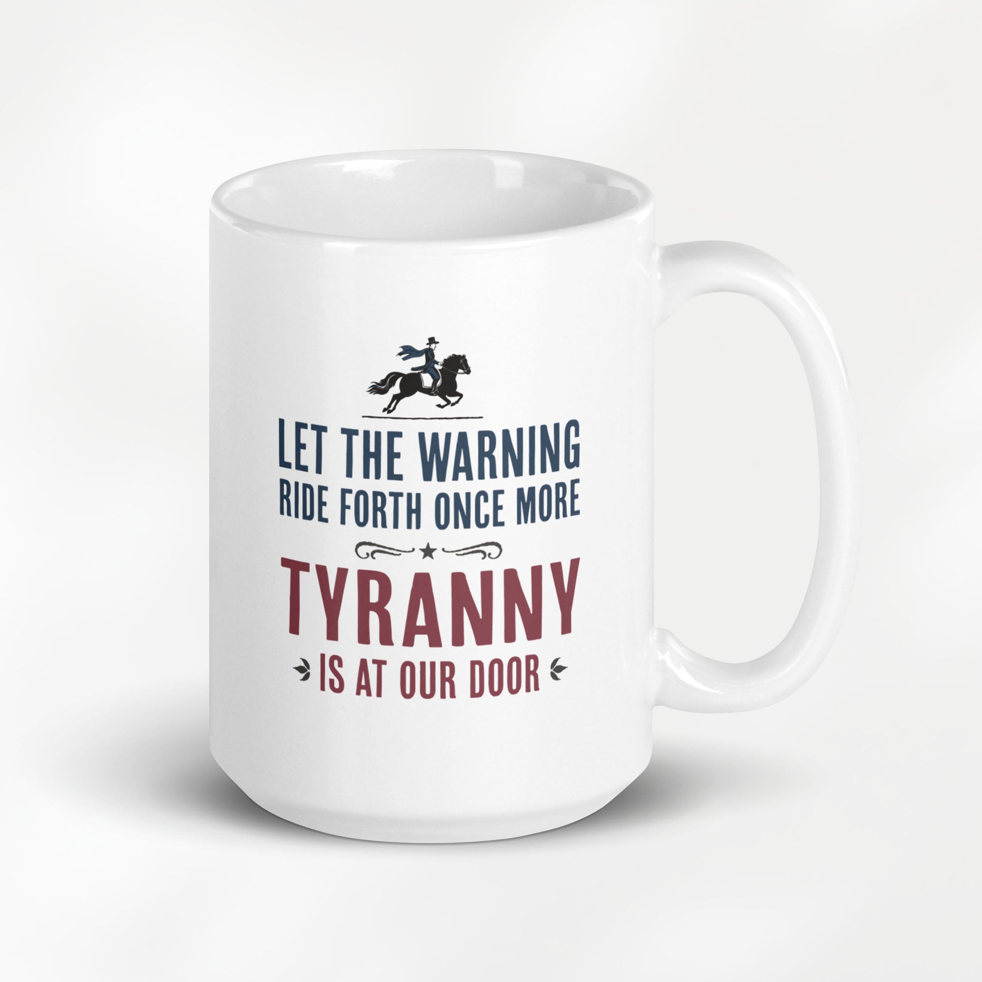15 ounce white ceramic coffee mug with a historical-style design reading “Let the warning ride forth once more — Tyranny is at our door."