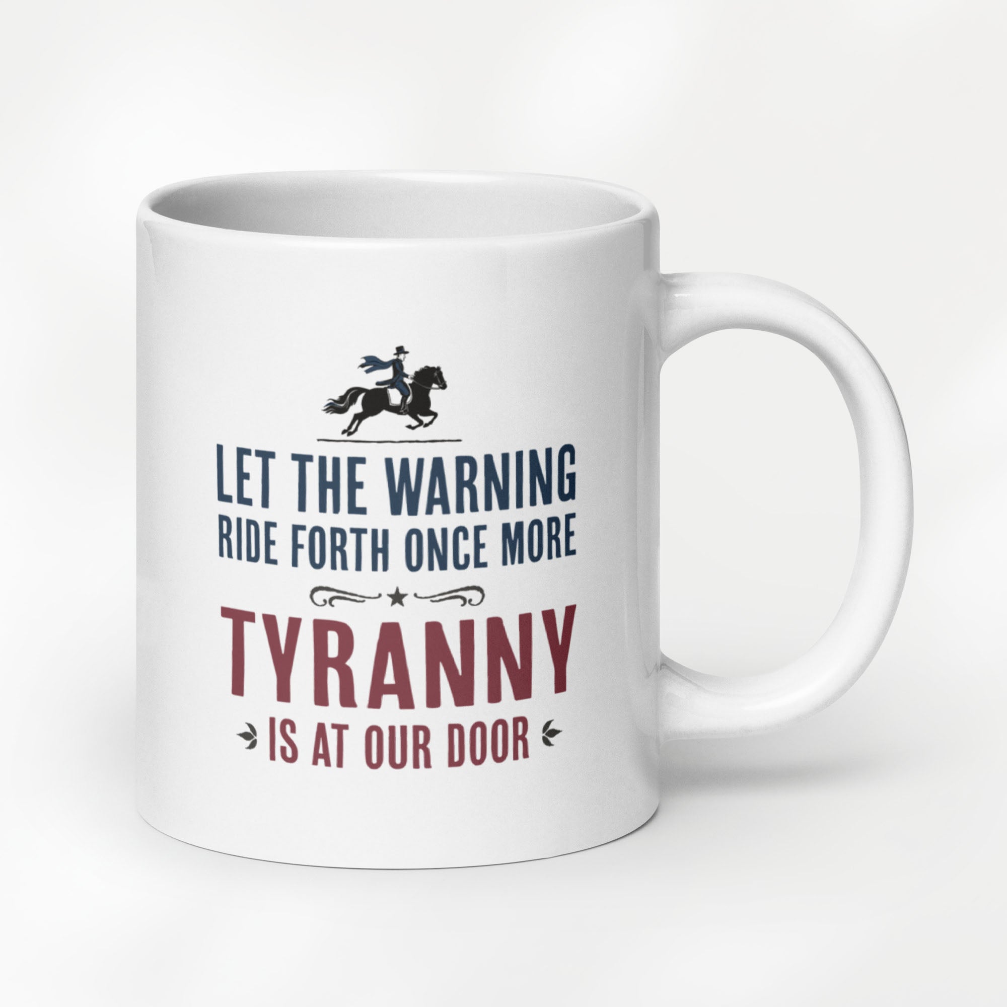 20 ounce white ceramic coffee mug with a historical-style design reading “Let the warning ride forth once more — Tyranny is at our door."