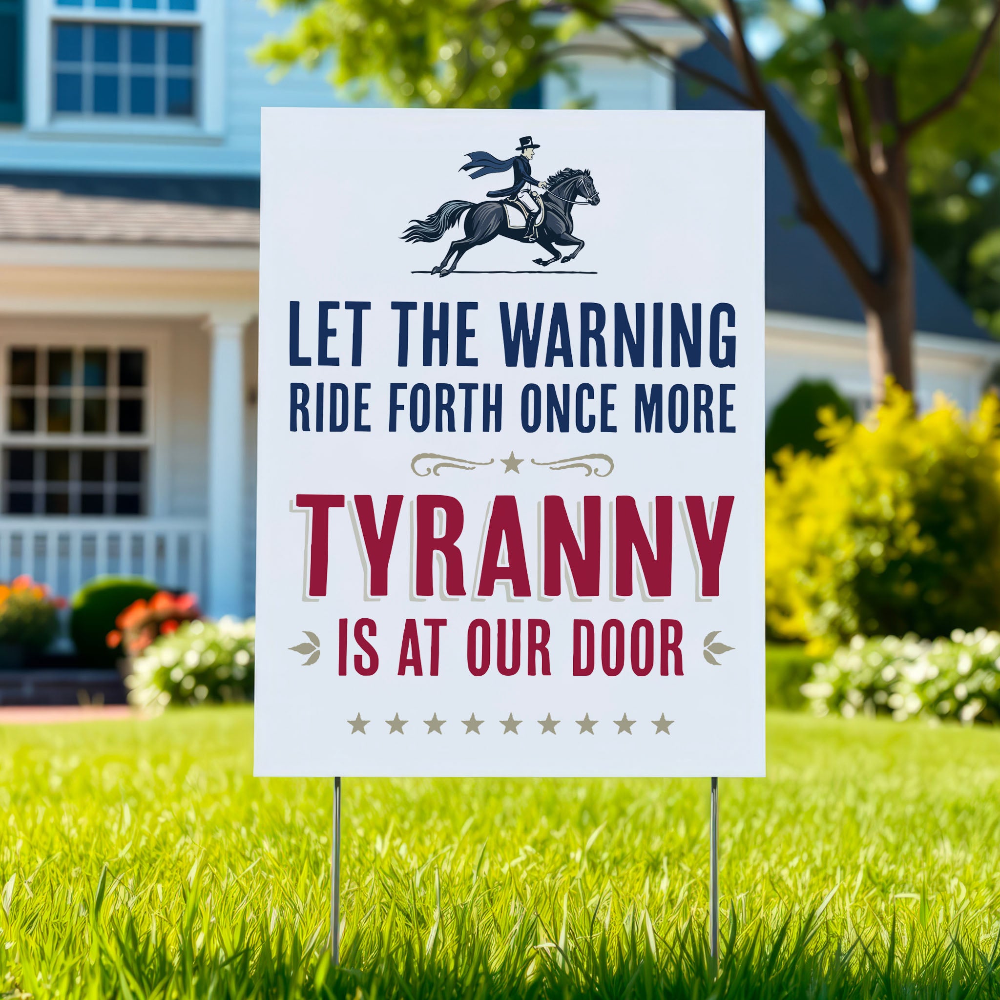 Yard sign in green lawn with text "Let the warning ride forth once more, Tyranny is at our door" and illustration of Paul Revere on a horse.