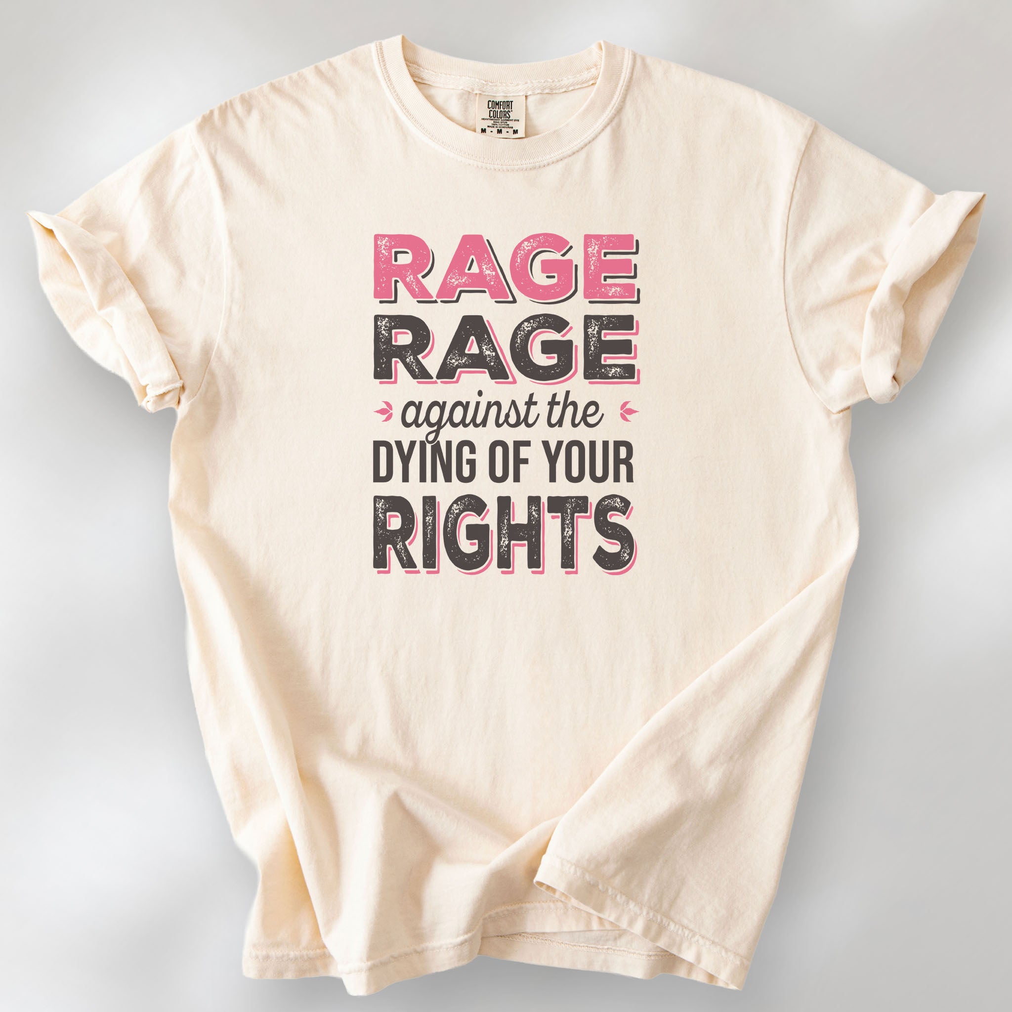 Ivory t-shirt with distressed bold text that reads "rage rage against the dying of your rights".