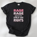 Black protest t-shirt with bold pink and white text reading “rage rage against the dying of your rights” – feminist anti-trump activist shirt.