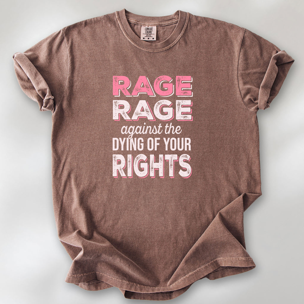 Espresso protest t-shirt with bold pink and white text reading “rage rage against the dying of your rights” – feminist anti-trump activist shirt.