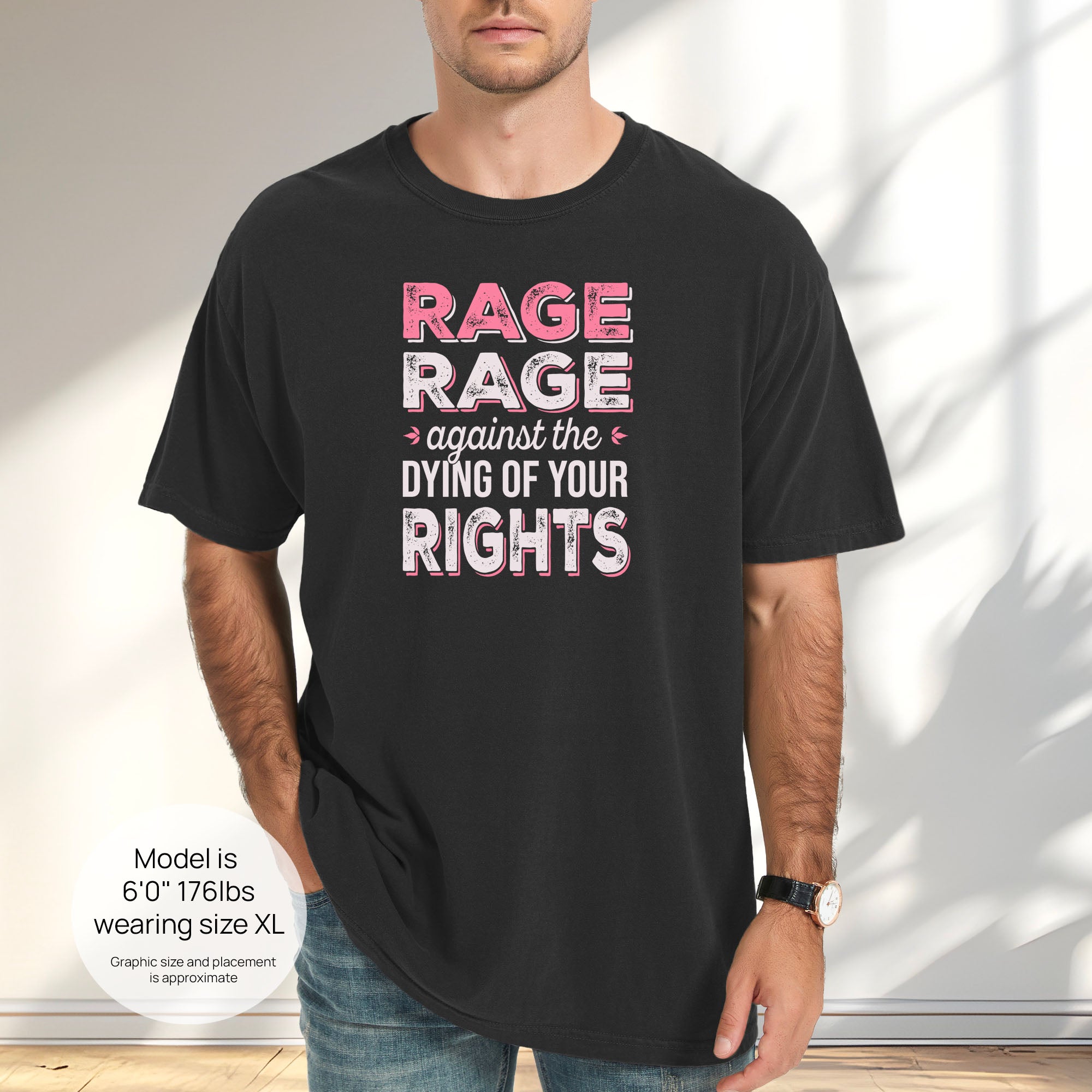 Male model wearing black t-shirt with distressed bold text that reads "rage rage against the dying of your rights".
