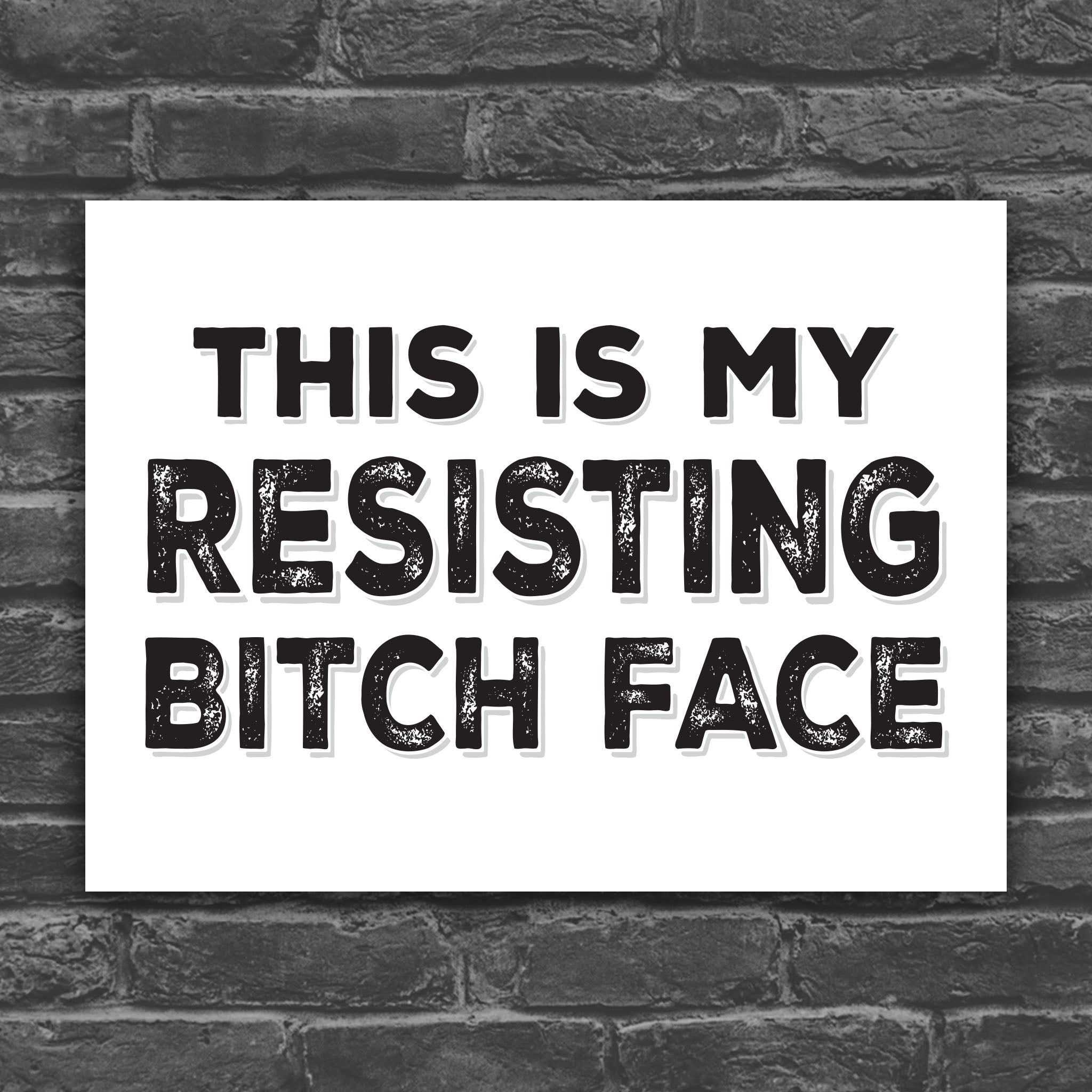 Black and white version of protest sign with distressed text that reads "This is my resisting bitch face" in all uppercase letters.