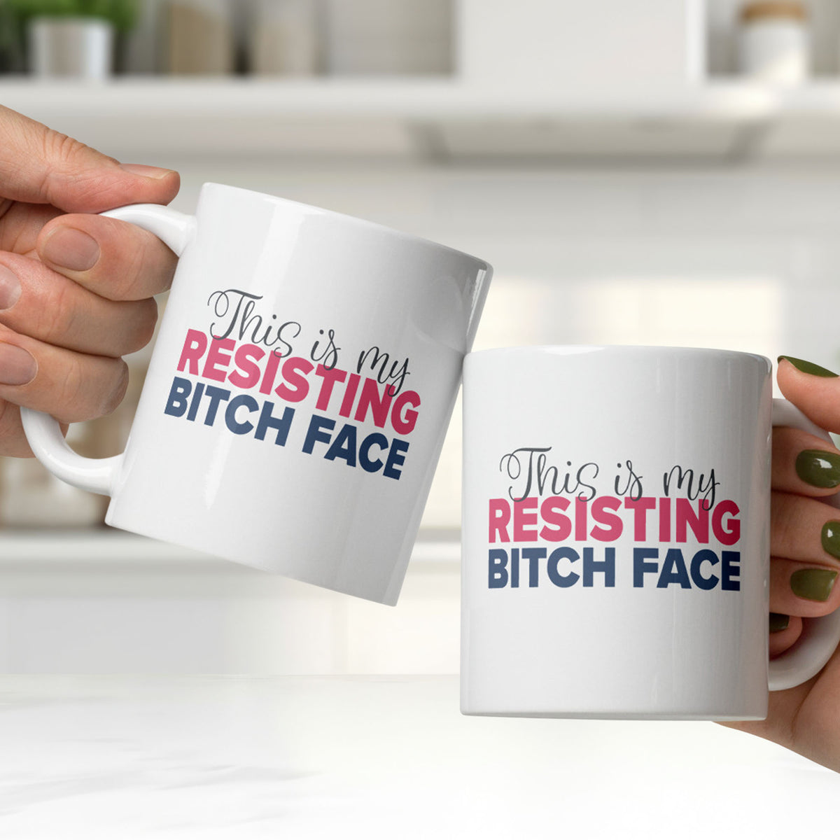 Two people's hands clinking white ceramic coffee mugs with a graphic that reads "This is my resisting bitch face" in stylized text.