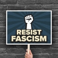 Downloadable, printable protest sign with blue burst background and white raised fist above text that reads "Resist fascism" in all uppercase letters.