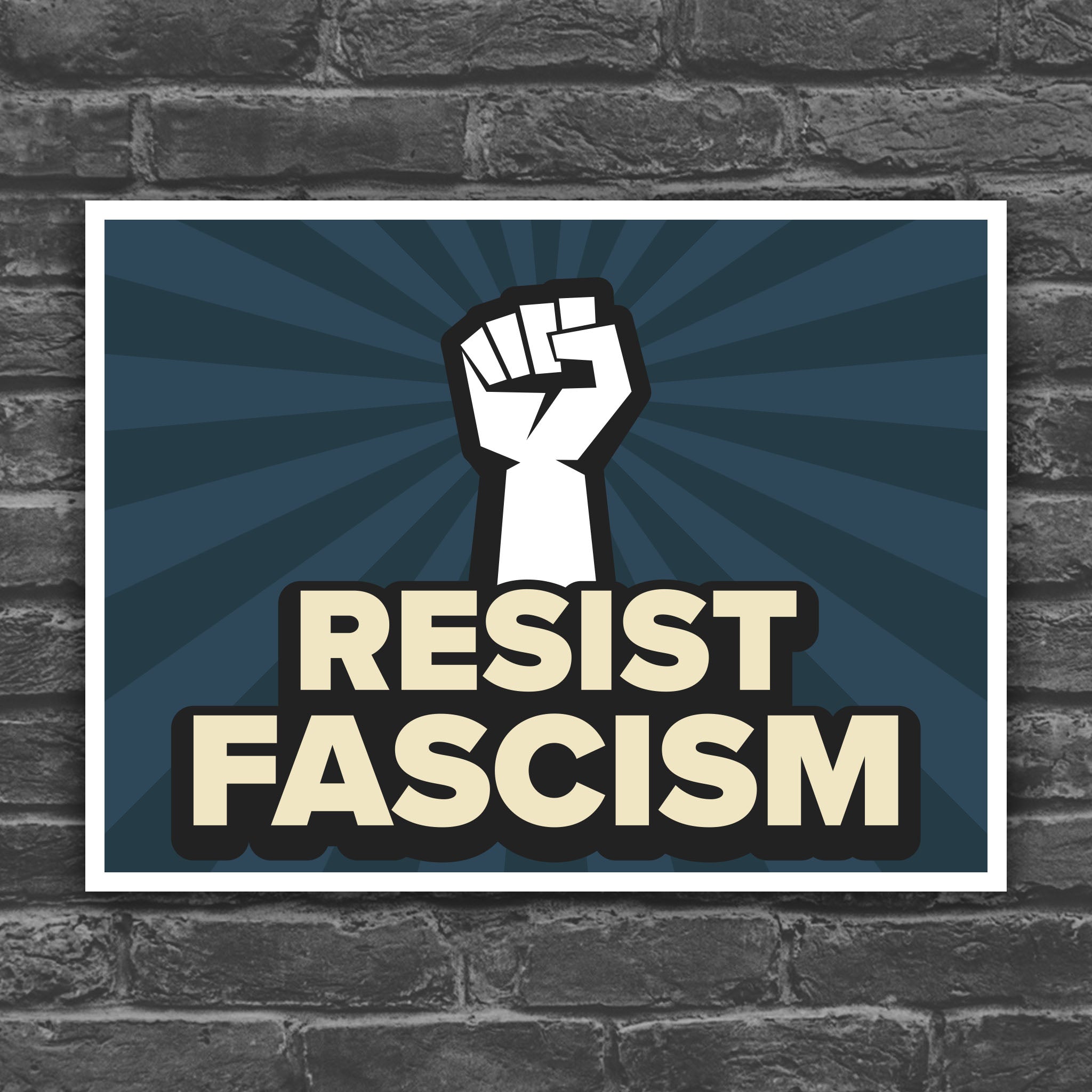 Color version of protest sign with red burst background and white raised fist above text that reads "Resist fascism" in all uppercase letters.