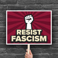 Downloadable, printable protest sign with red burst background and white raised fist above text that reads "Resist fascism" in all uppercase letters.