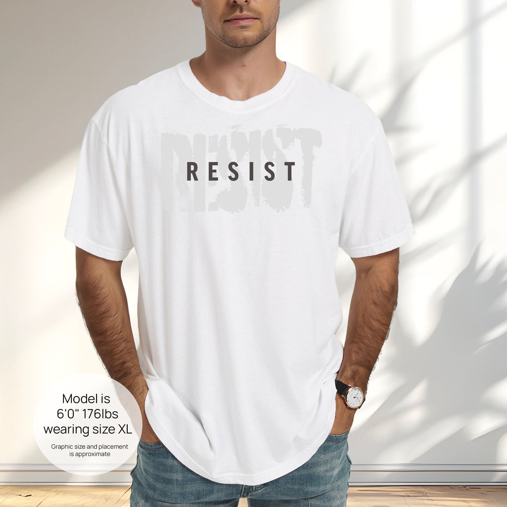 Male model wearing white t-shirt with the word "resist" atop the word "resist" in a grunge background texture. Includes size and fit information for the model who is 6 feet 0 inches, 176 pounds, and wearing a size XL shirt.
