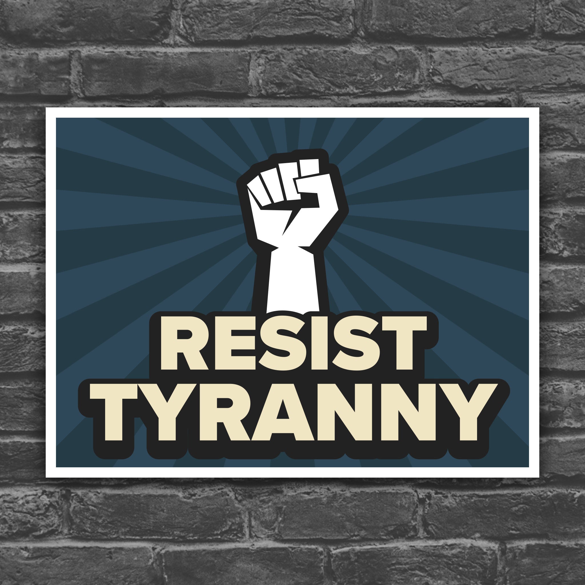 Color version of protest sign with bold gold text on a blue background hat reads "resist tyranny" below a raised fist.