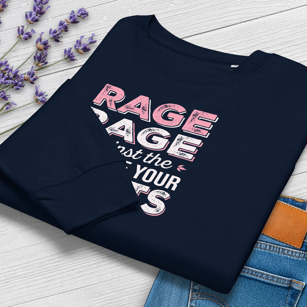 Folded navy protest sweatshirt with bold pink and grey text reading “rage rage against the dying of your rights” – feminist anti-trump activist shirt.