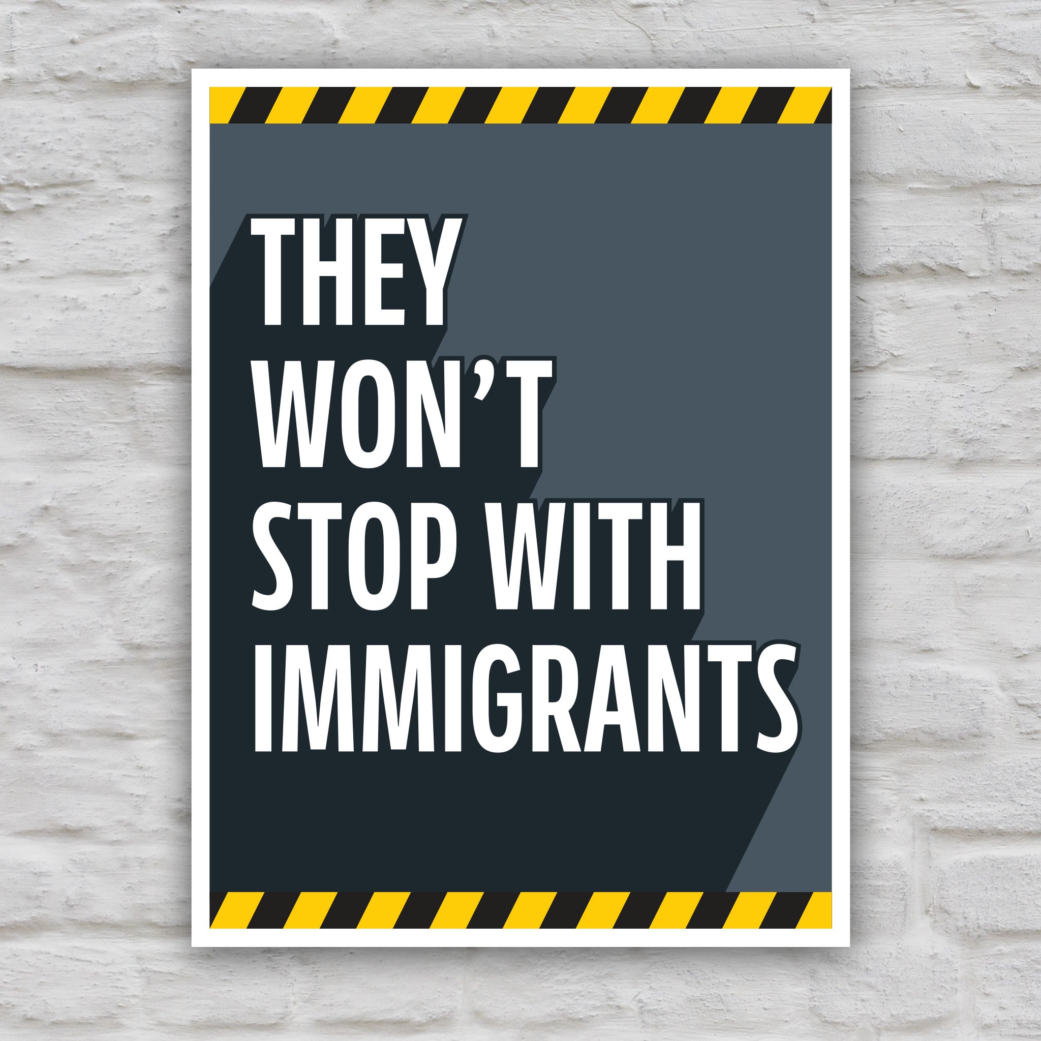 Color version of anti-ICE, anti-Trump protest sign with bold white text reading "they won't stop with immigrants" on a grey background with yellow warning stripes at the top and bottom.