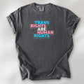 Pepper t-shirt with graphic reading "trans rights are human rights" in the colors of the trans flag.