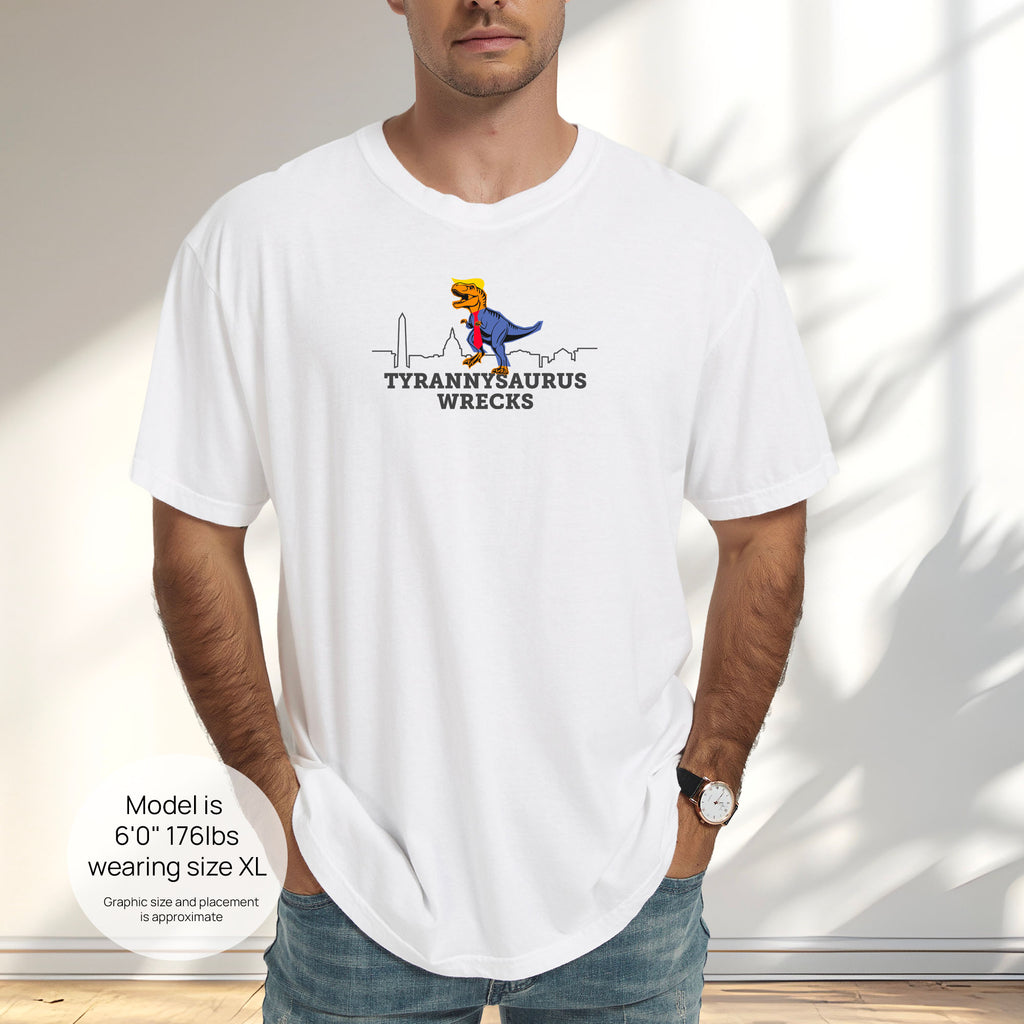 Male model wearing white t-shirt with a funny drawing of an orange t-rex dinosaur. Includes size and fit information for the model who is 6 feet 0 inches, 176 pounds, and wearing a size XL shirt. T-Rex is dressed in a blue suit with a red tie that's too long, stupid yellow hair, and tiny hands. The dinosaur is stepping on a line drawing of the Washington DC skyline. Under the dinosaur is bold text that reads "tyranny saurus wrecks."