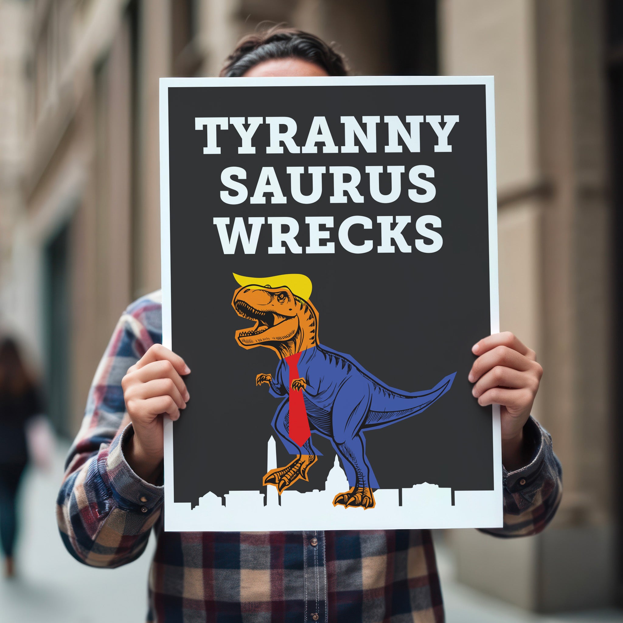Funny anti-Trump political yard sign with cartoon T. rex in a suit, yellow hair, and red tie, with bold text “TYRANNY SAURUS WRECKS” being held in the hands of a person on a street.
