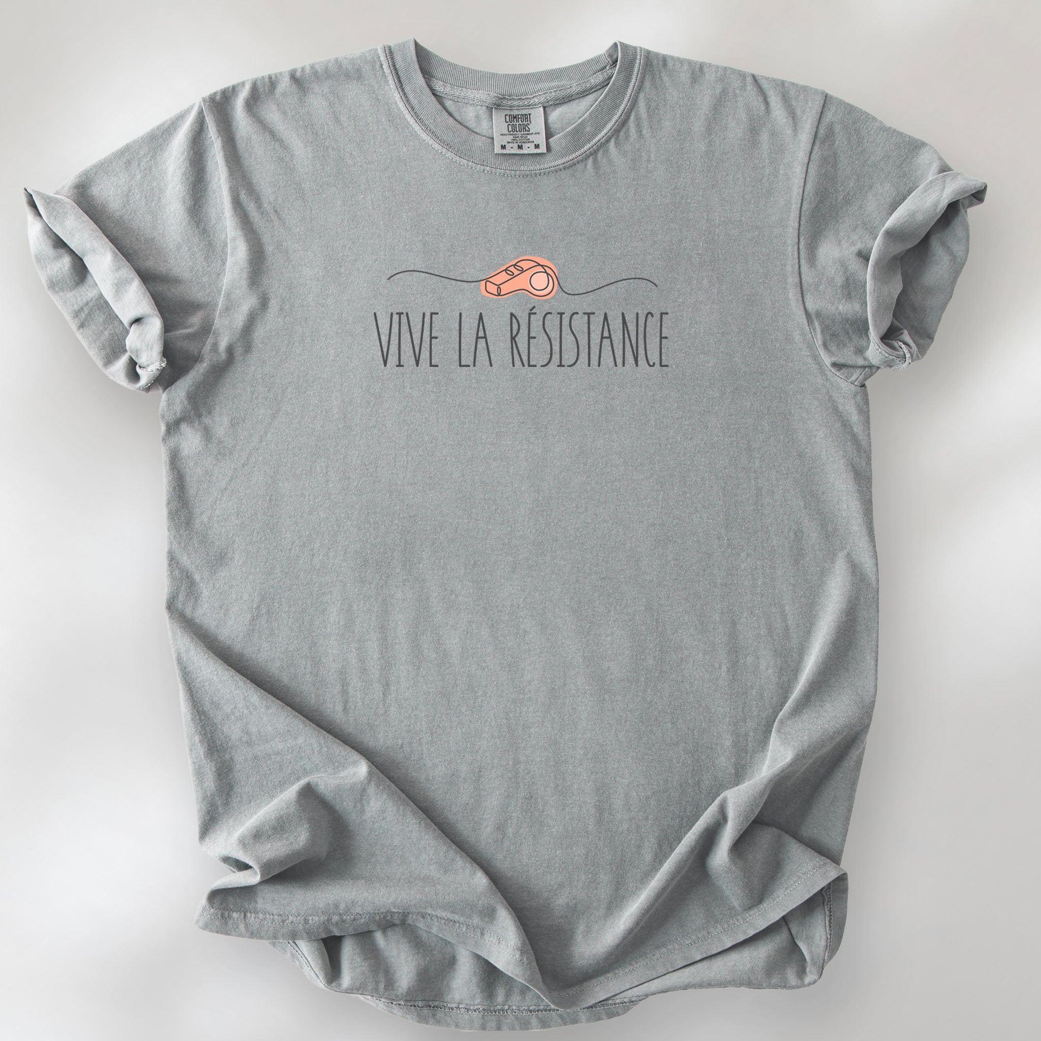 Granite unisex t-shirt reading “Viva La Resistance” with a whistle illustration referencing community alert systems used to warn neighbors of ICE presence.