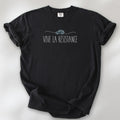 Black unisex t-shirt reading “Vive La Resistance” with a whistle illustration referencing community alert systems used to warn neighbors of ICE presence.