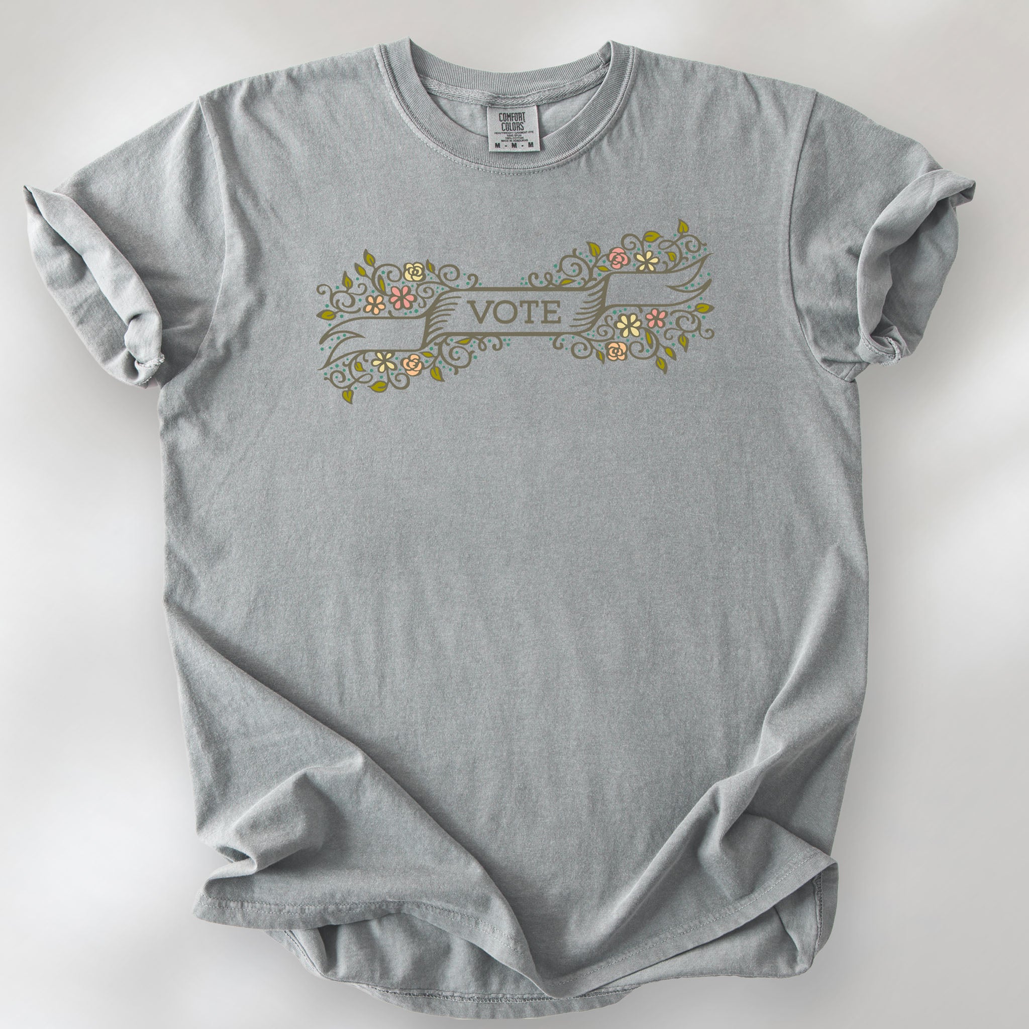 Granite t-shirt with vintage style floral illustration and a banner reading “vote” in the center.