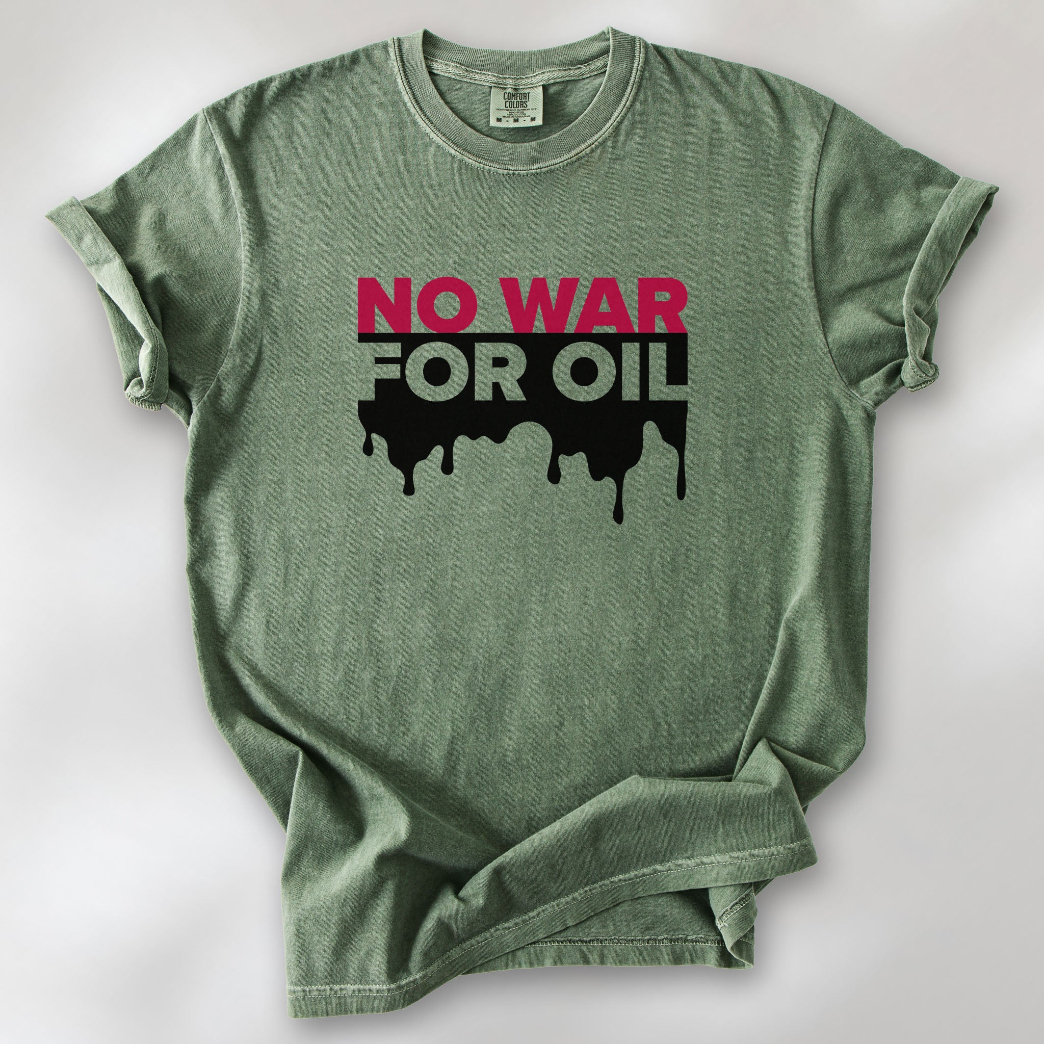Moss protest t-shirt with bold text reading “No War for Oil” and dripping oil graphic, anti-war political shirt.