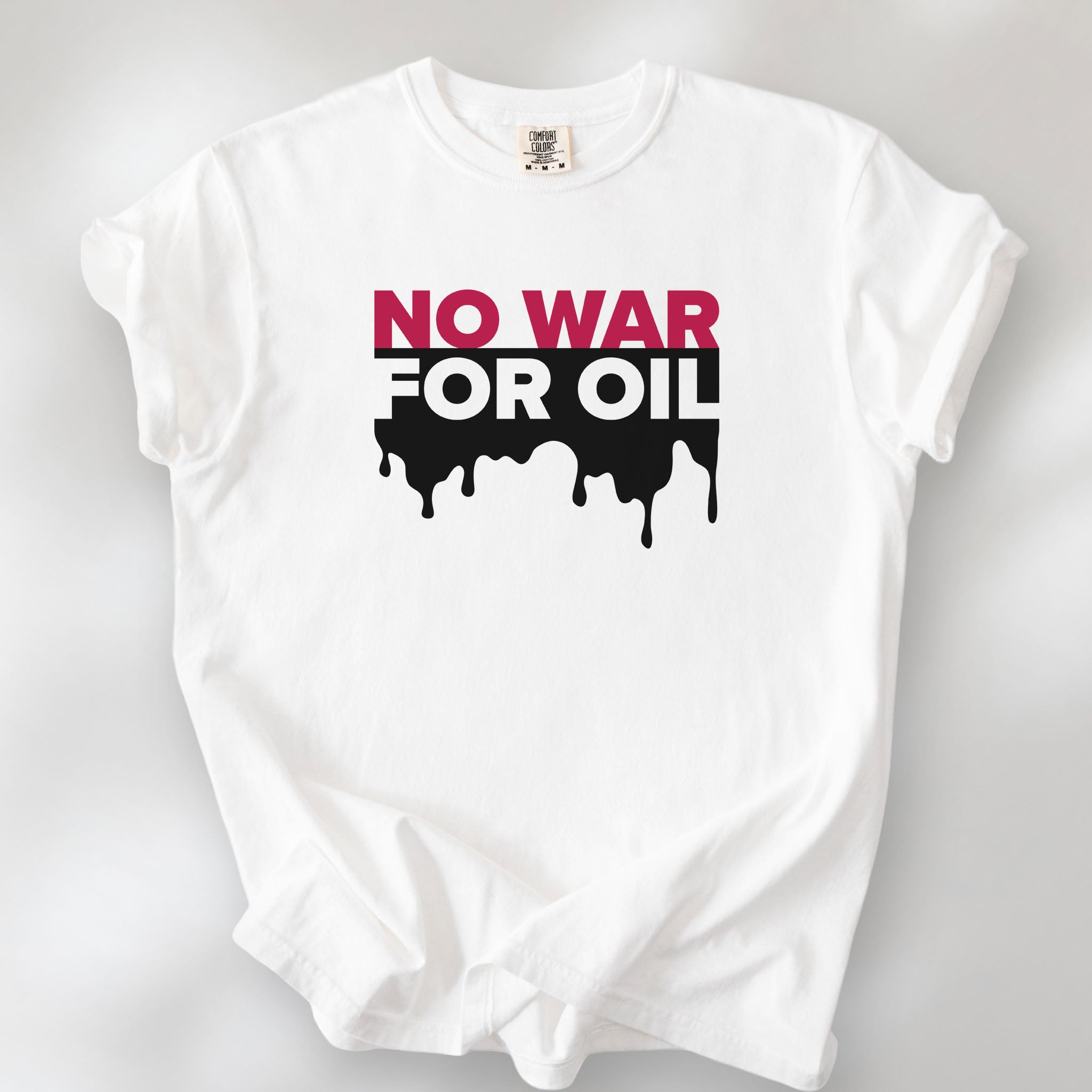 White protest t-shirt with bold text reading “No War for Oil” and dripping oil graphic, anti-war political shirt.