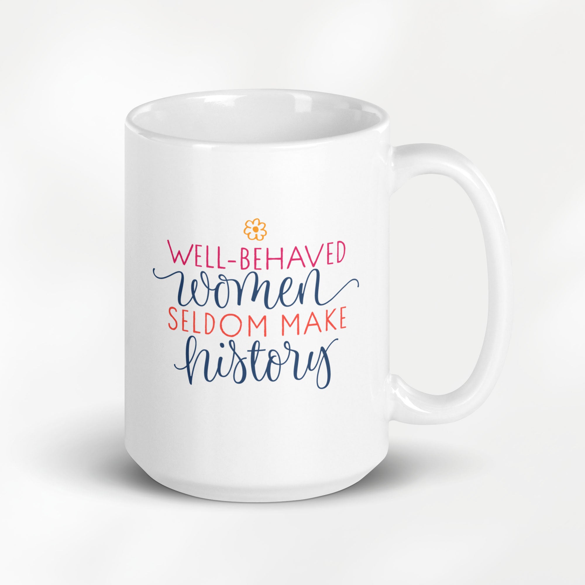 15 ounce ceramic mug with graphic that reads "well-behaved women seldom make history".