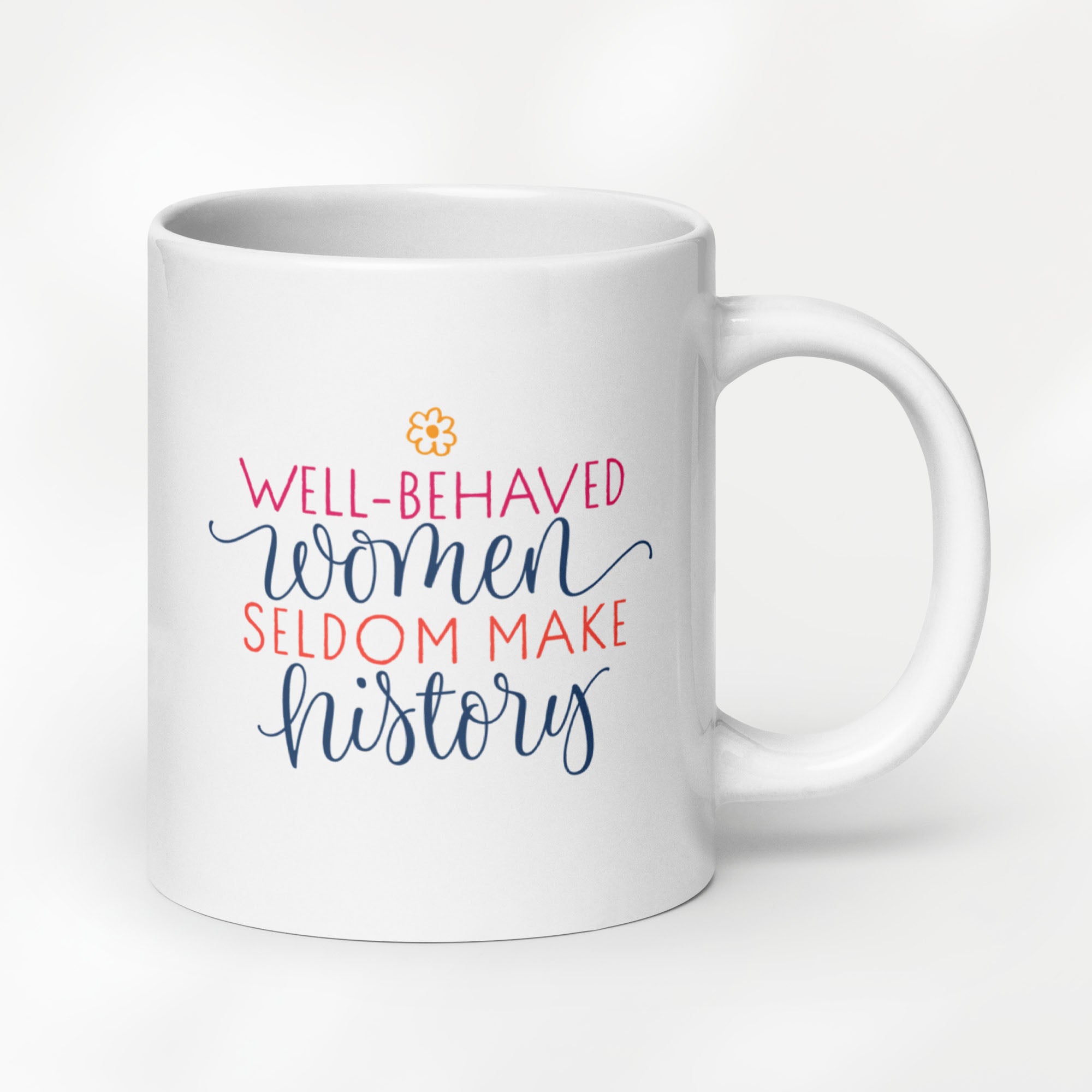 20 ounce ceramic mug with graphic that reads "well-behaved women seldom make history".