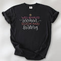 Black feminist t-shirt with colorful text that reads “Well-behaved women seldom make history” — empowering women’s rights shirt and activist apparel.