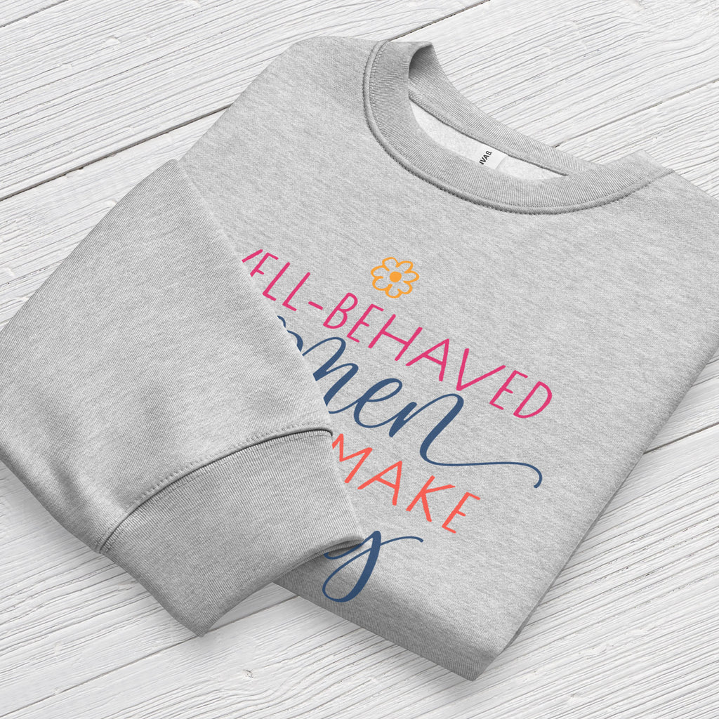 Folded athletic heather grey crewneck sweatshirt with stylized text graphic that reads "well-behaved women seldom make history",  displaying neck and sleeve cuffs.