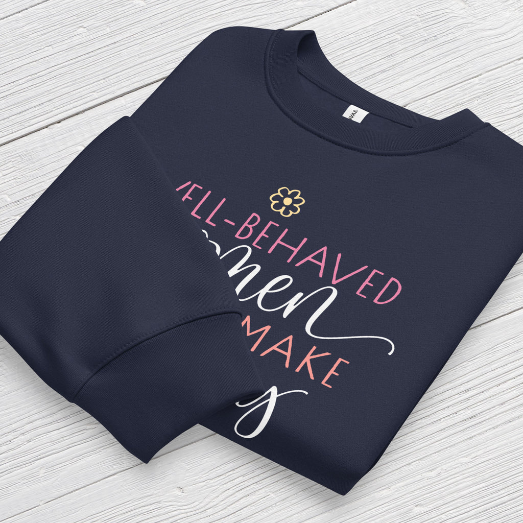 Folded navy crewneck sweatshirt with stylized text graphic that reads "well-behaved women seldom make history",  displaying neck and sleeve cuffs.