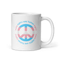 11 ounce coffee mug with a peace sign in transgender flag colors and the text “Trans Rights Are Human Rights” in a circular design around the peace sign.