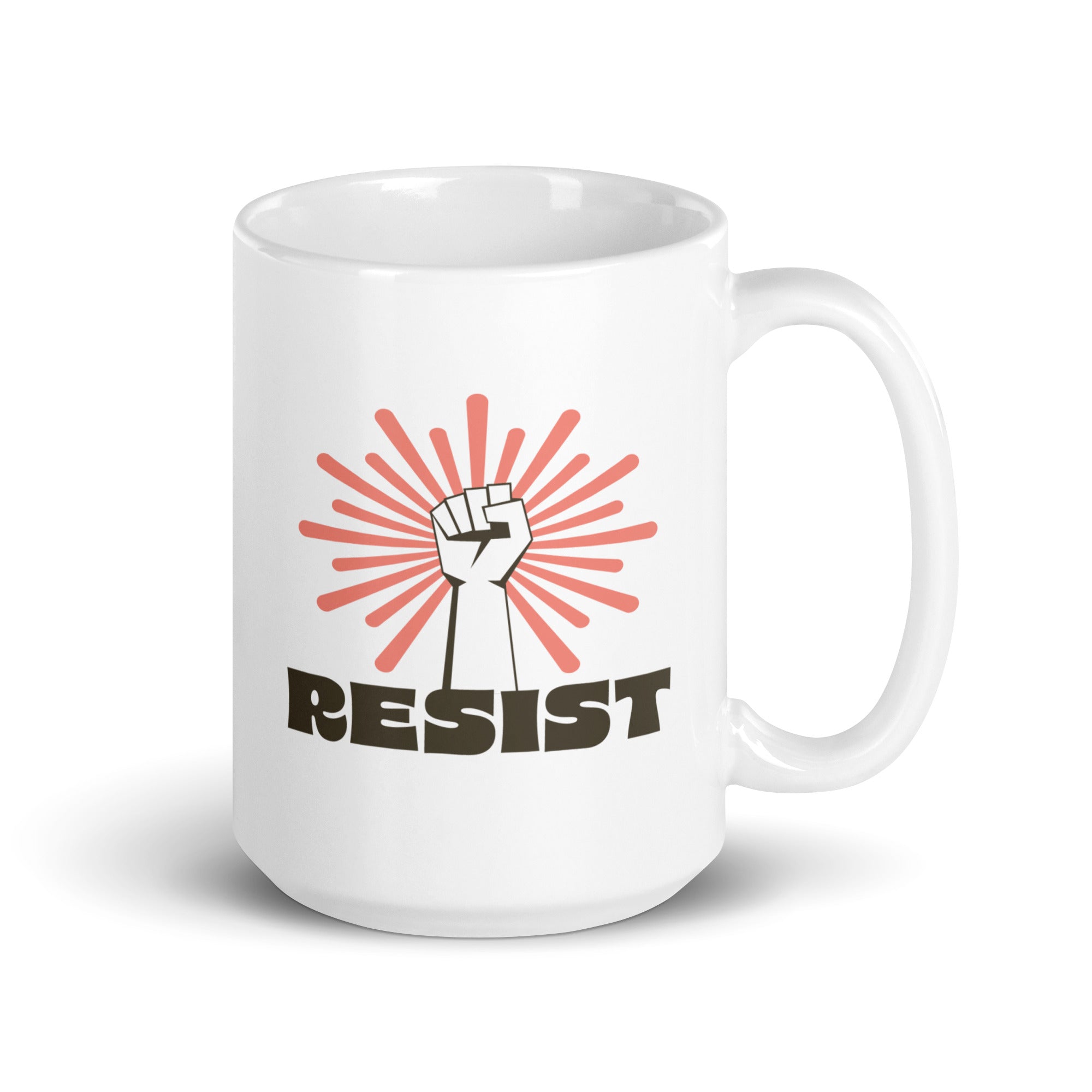 15 ounce coffee mug with a raised fist graphic in front of a coral burst, and bold retro-styled text that says "resist."