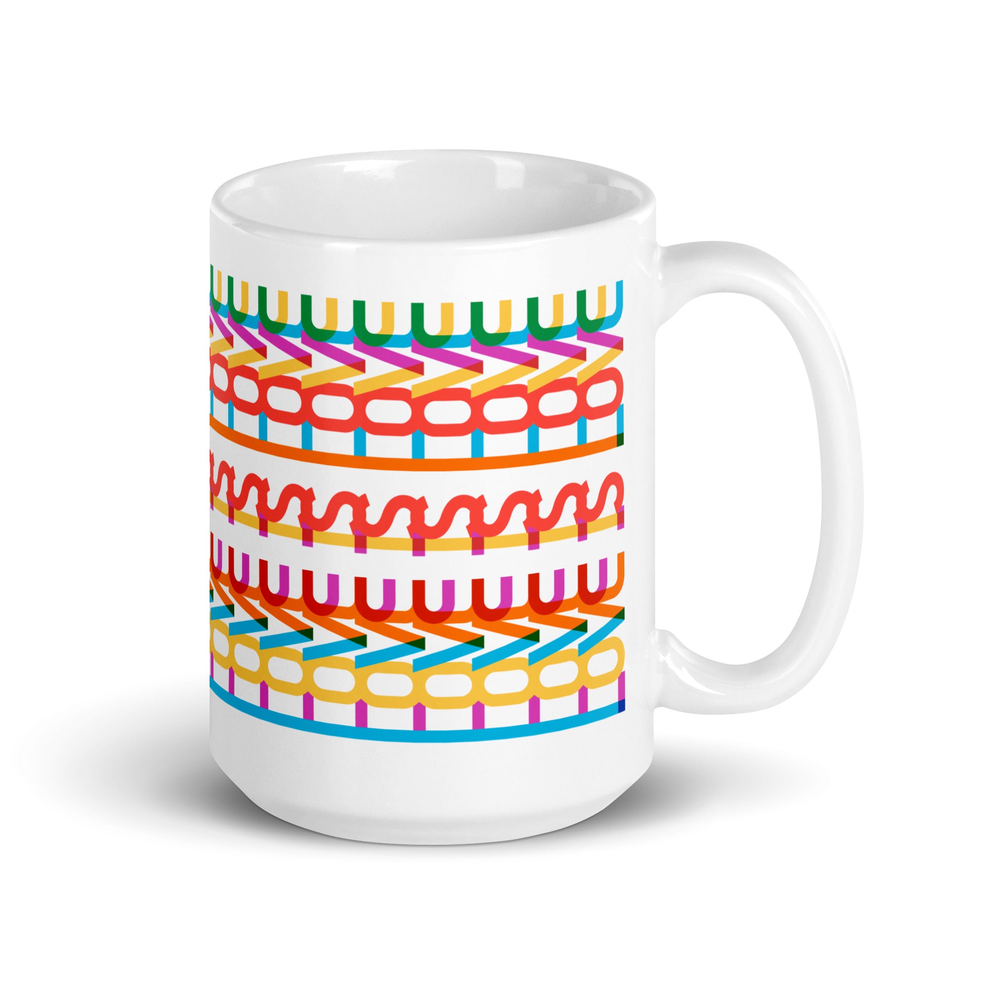 15 ounce coffee mug with a repeating hidden “love is love” message in the Gilbert font, featuring bright rainbow-inspired patterns wrapped around the mug.